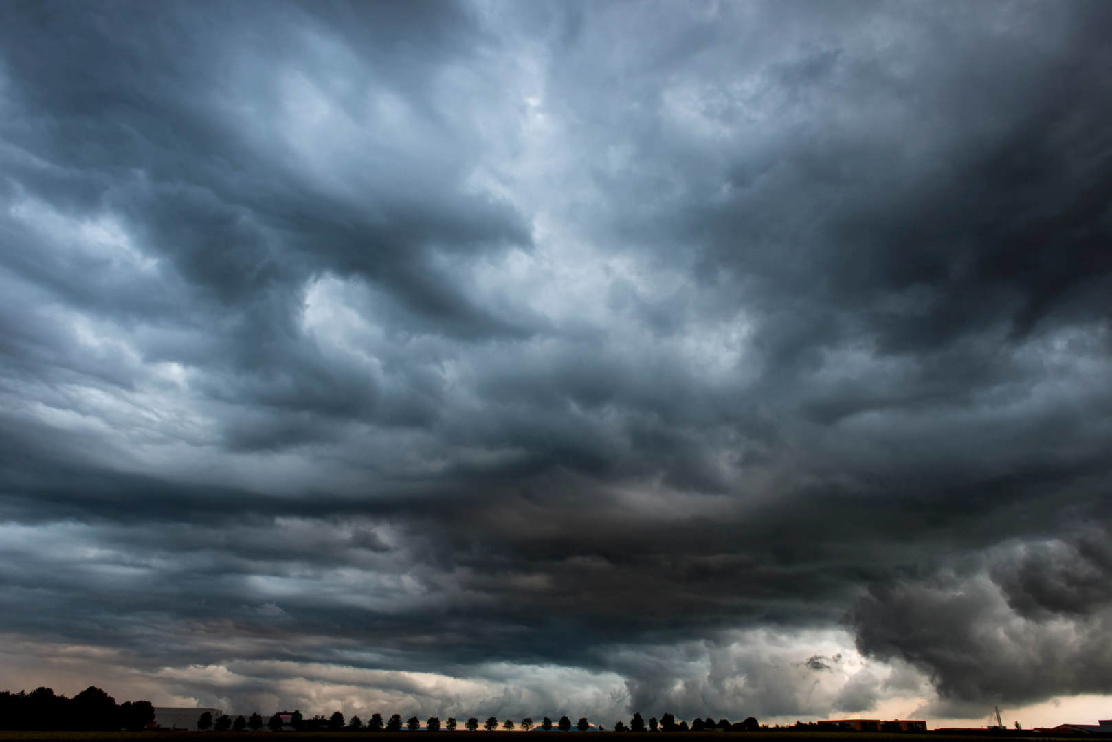Stormy cloudy sky dramatic dangerous dark gray cloudscape Stormy cloudy sky dramatic dangerous dark gray cloudscape