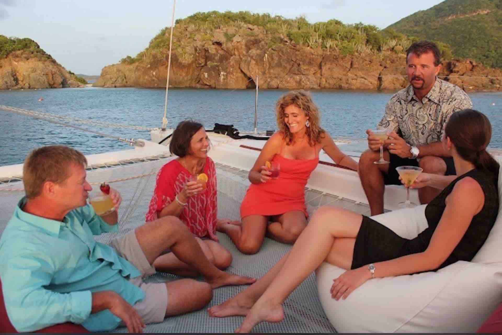 sail San Blas Sailing charter catamaran guests with cocktails