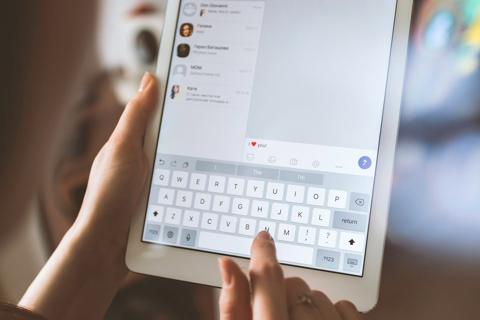 Content Moderation, person using white iPad