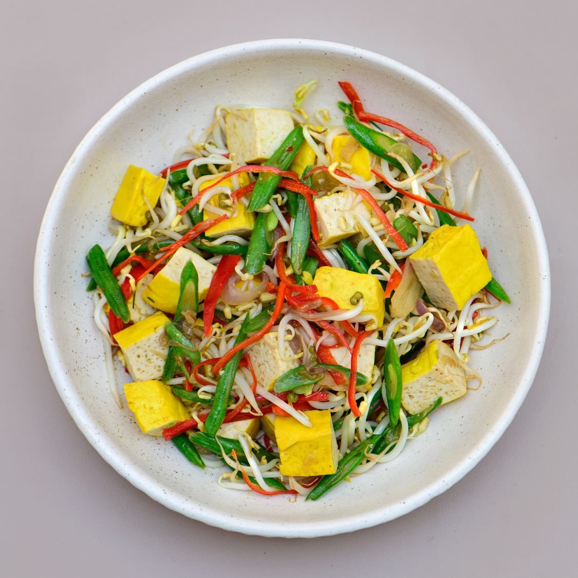 Authentic Indonesian Food you can find in Bali 4 Sprouts and tofu dish served at THIS IS BALI restaurant in Ubud, offering a healthy plant-based option from one of the best restaurants in Ubud