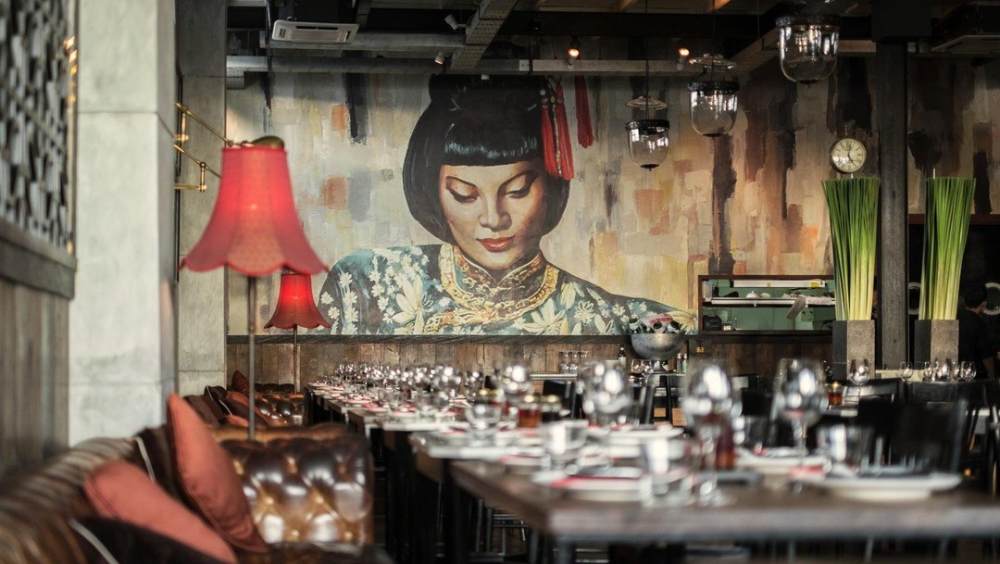 A Foodie's Guide To Top 1 Best Restaurants in Bali 3 Front view of Mamasan Restaurant Bali with stylish industrial design