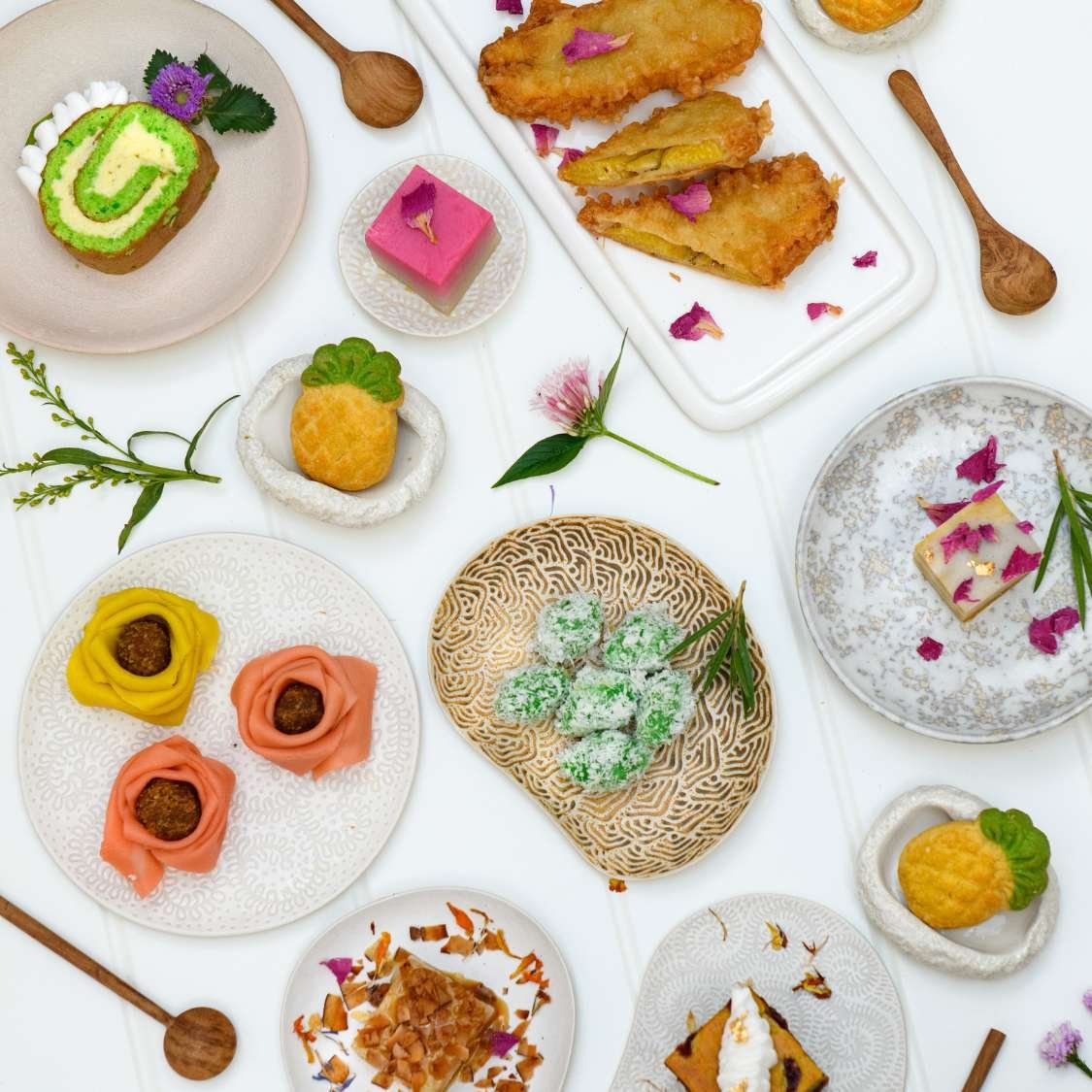 A Food Lover’s Guide to Authentic Balinese Dishes in Ubud 4 THIS IS BALI: Delicious Indonesian desserts such as Klepon along with savory Balinese dishes, capturing the colorful and diverse flavors of Bali