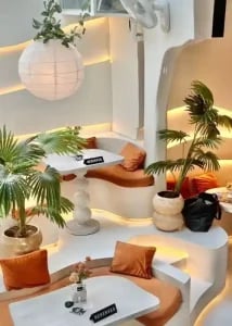 Beautiful restaurant interior at THIS IS BALI featuring traditional Balinese design and warm lighting