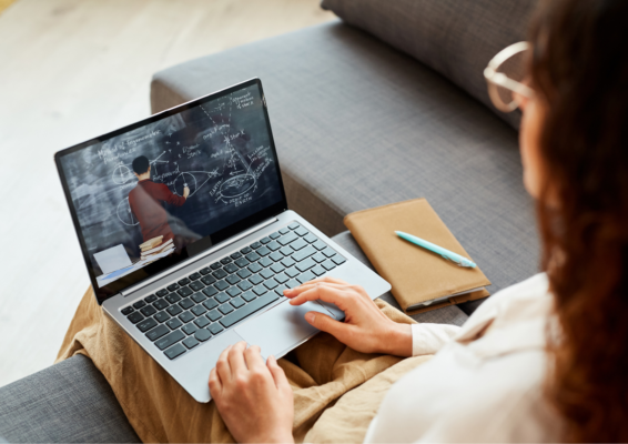 woman watching videos as part of marketing strategy
