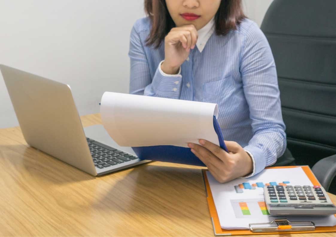 woman checking a report
