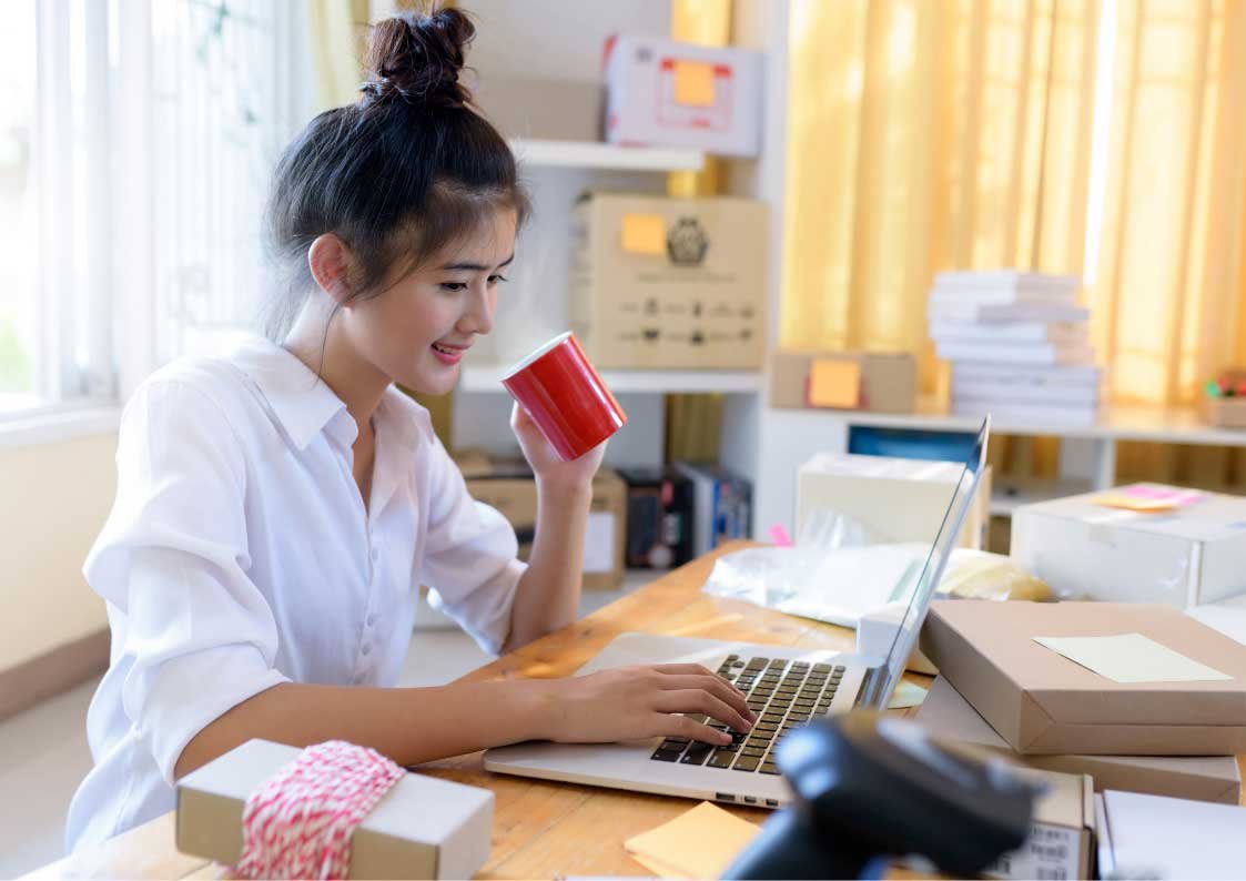 woman drinking a coffee