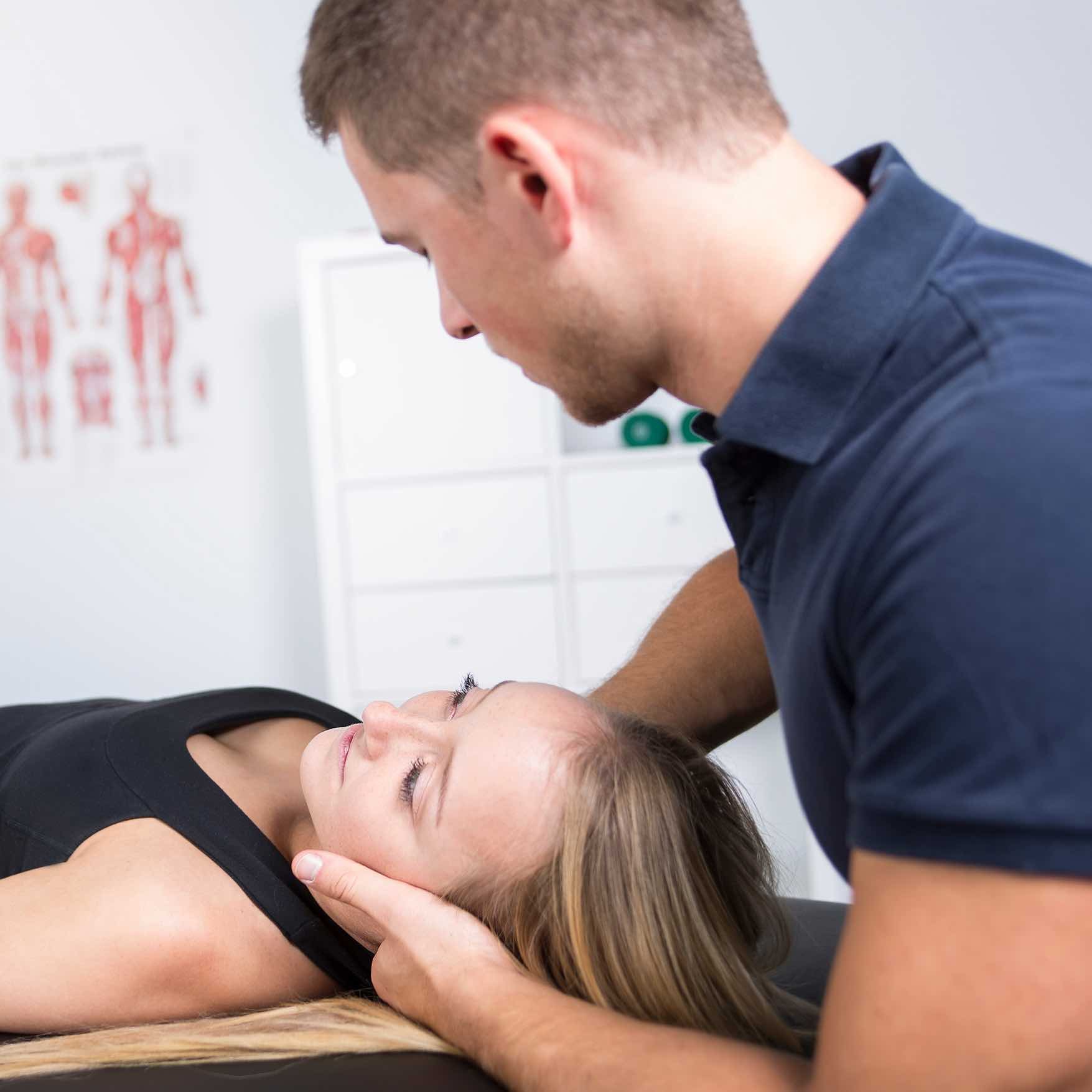 Chiropractor Treating Women's Neck Chiropractor Treating Women's Neck