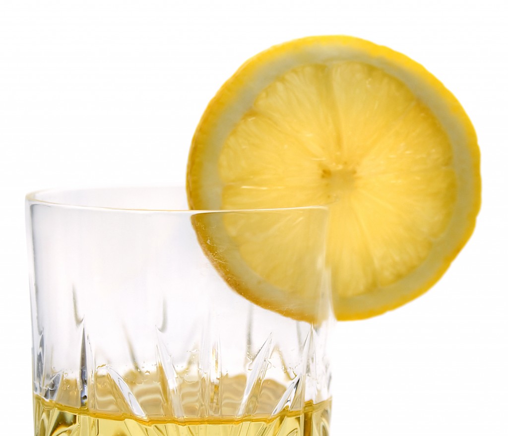 lemon on a glass of lemonade
