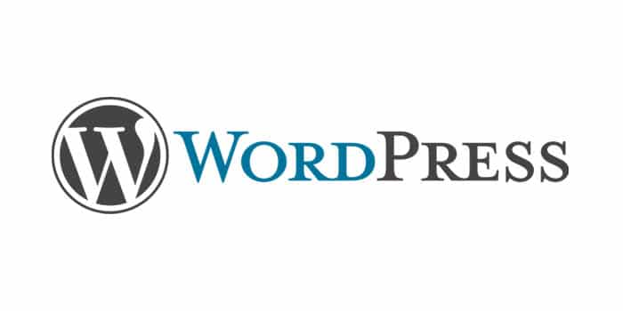 WordPress-logotyp med ett stiliserat "W" i en svart cirkel till vänster, följt av texten "WordPress" i blått och grått.