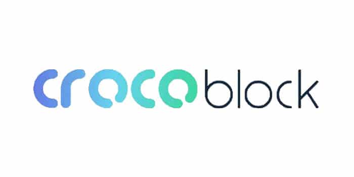 Logotyp som visar ordet "Crocoblock" med stiliserade blå och gröna bokstäver.